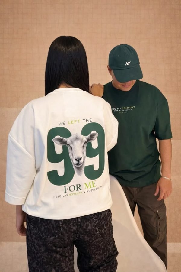 Models wearing faith-inspired oversized graphic T-shirts